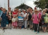 Anziani in spiaggia con l&#039;Estate terza età